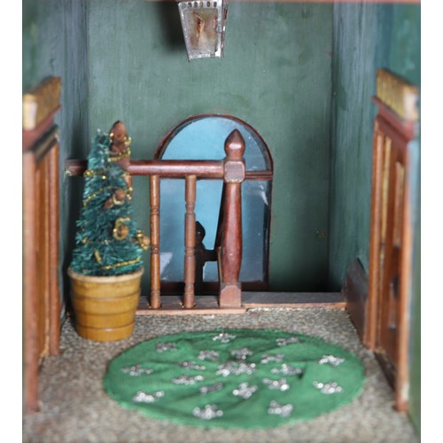 2 - A good painted red brick wooden Victorian Dolls house in the Gothic style, with contents, the façade... 