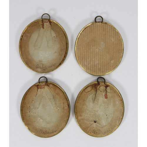 9 - Four 19th century miniature portraits, the finely painted oval framed shoulder and head portraits of... 