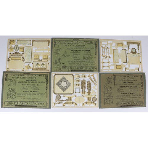 26 - Seven 'Aux Galeries Lafayette Menage De Poupee' unassembled card dolls house furniture sets, circa 1... 