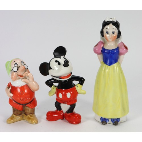 43 - Mickey Mouse glazed ceramic Toothbrush holder by Maw & Co, English 1930s, standing with hands on... 