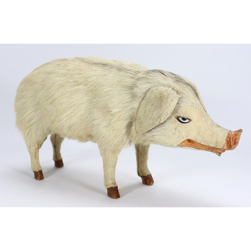24 - A rare bon-bonier pig, probably French circa 1900, the skin covered white fur pig with glass eyes, p... 