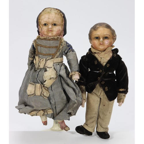 49 - A pair of wax over composition dolls in original clothes, German circa 1860, both with black glass p... 