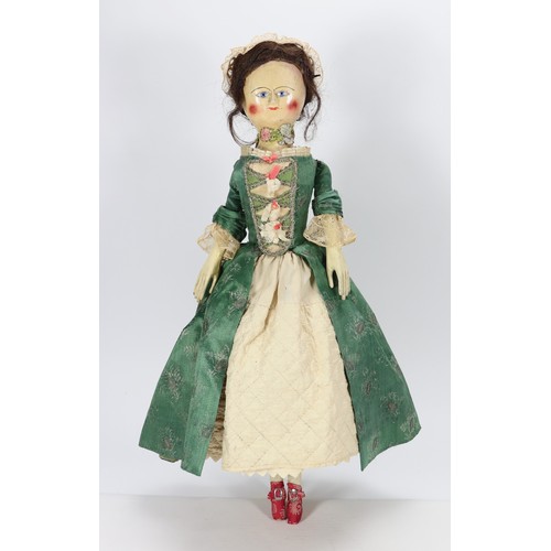 45 - A good early English George II painted wooden doll, circa 1750, the gesso head with inset blue glass... 
