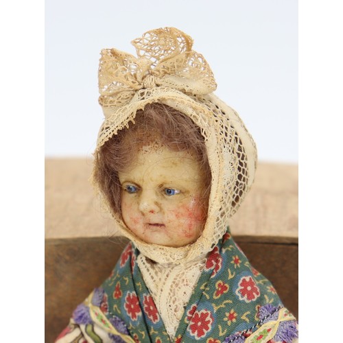52 - A rare early wax head doll, probably French, mid nineteenth century, the nicely moulded head with in... 