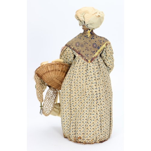 48 - An early nineteenth century English wax peddler doll, the bees wax head with black beaded eyes, pain... 