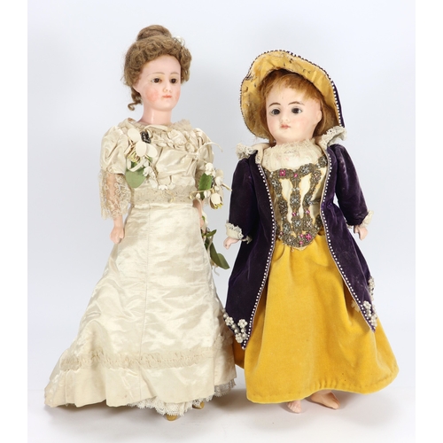54 - A wax over composition shoulder head bride doll, German 1890s, with fixed brown glass eyes, painted ... 