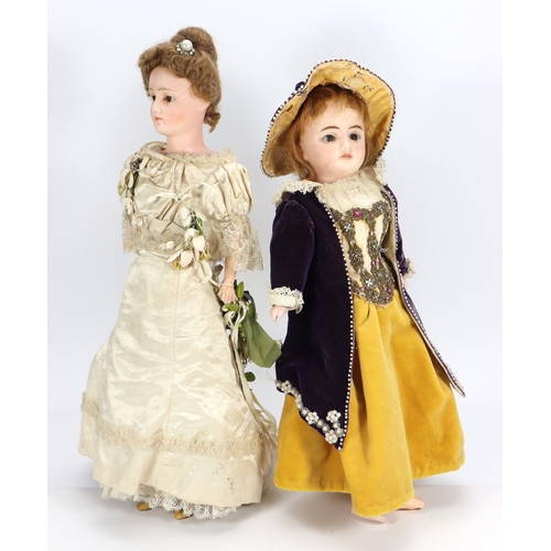 54 - A wax over composition shoulder head bride doll, German 1890s, with fixed brown glass eyes, painted ... 