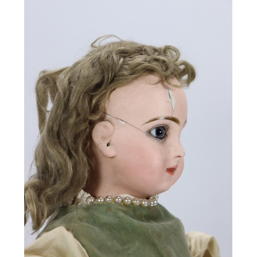 60 - A Tete Jumeau bisque head Bebe doll, size 8, French circa 1890, the pale bisque head with fixed blue... 
