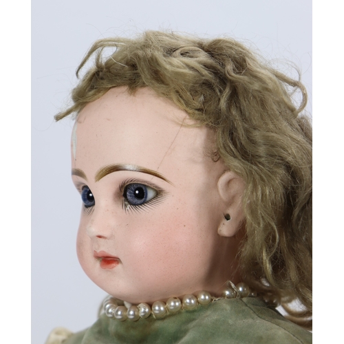 60 - A Tete Jumeau bisque head Bebe doll, size 8, French circa 1890, the pale bisque head with fixed blue... 