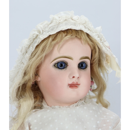 59 - A Tete Jumeau bisque head Bebe doll, size 7, French circa 1890, the pale bisque head with fixed blue... 