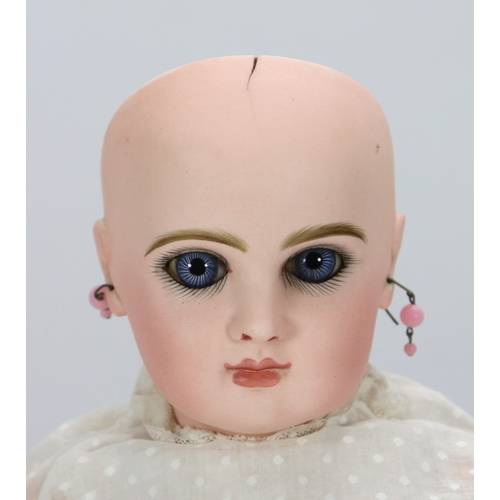 59 - A Tete Jumeau bisque head Bebe doll, size 7, French circa 1890, the pale bisque head with fixed blue... 