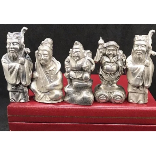 38 - A collection of six Chinese solid silver scroll paperweight figures