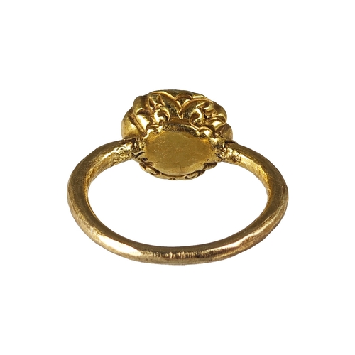 98 - Gold ring set with ancient glass in shape of lotus bud, Ancient South East Asia period, 5.4g