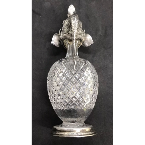 28 - A silver cut glass rare decanter 
Possibly Faberge 

Height 23cm
Diameter base 7.2cm