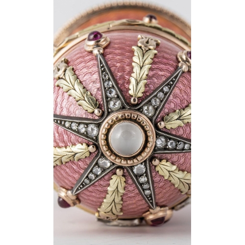 60 - Faberge 14k Solid gold and enamel faberge suprise egg. Set with top moonstone and diamonds eggs open... 