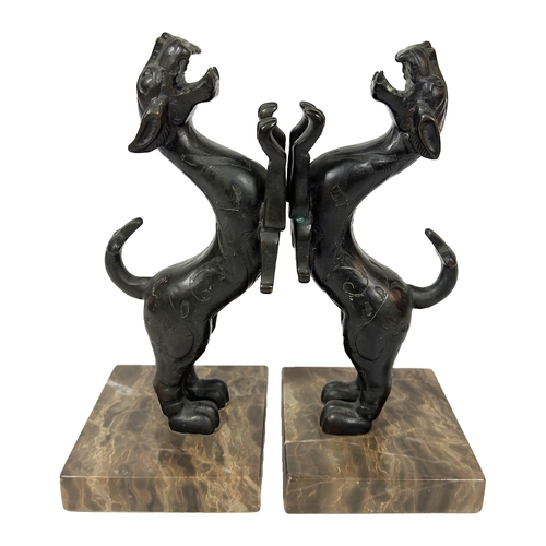 136 - A pair bronze Chinese dogs