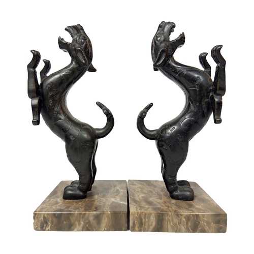 136 - A pair bronze Chinese dogs