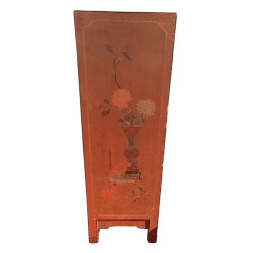 120 - A lacquered Chinese 2 door cabinet with floral decorations 94cm high 64cm wide.