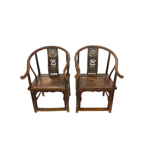 121 - A pair of 19th-century Chinese hardwood hoof shaped scholar chairs.