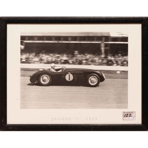 141 - Stirling at Work (4) Stirling Moss victorious at the Gold Cup, Oulton Park. A fine monochrome study ... 