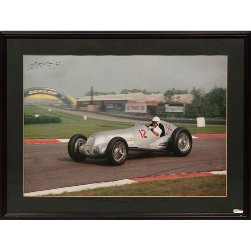 110 - A signed poster of Fangio in the W125Fangio demonstrating the Mercedes-Benz W125 at Donnington Park.... 