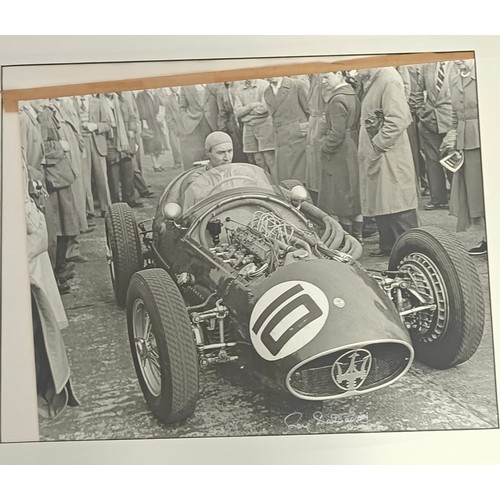 127 - Roy Salvadori, Four Photographs and Artworks (4) A monochrome photograph of Roy Salvadori aboard his... 