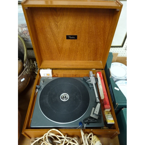 70 - A Radon teak cased turntable having a Garrard deck; a Radon 404 amplifier. (2)