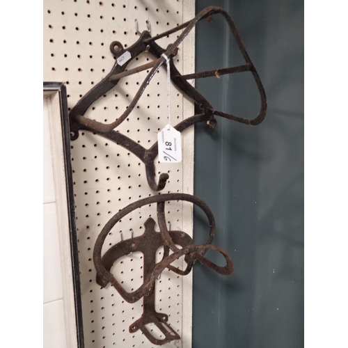 81 - Six various iron tack / saddle racks