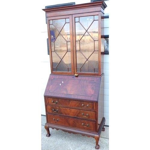 556 - An Edwardian mahogany bureau bookcase on ball & claw feet 98 cm wide