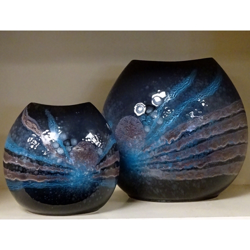 123 - Two Poole Pottery Celestial purse vases.