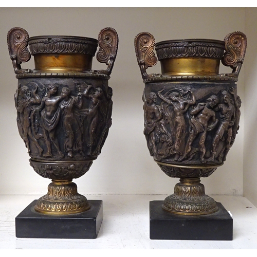 144 - A pair of classical influence urn vases, base metal a/f