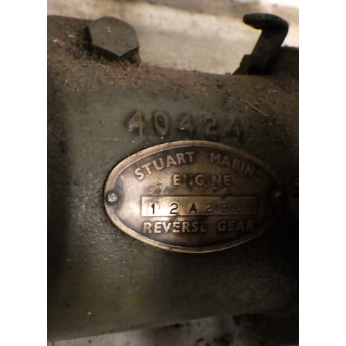 633 - A STUART MARINE ENGINE marked 12A296 reverse gear. SOLD AS SEEN.