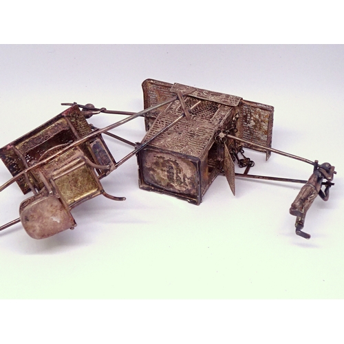 436 - Two Chinese sedan chair miniature models, white metal