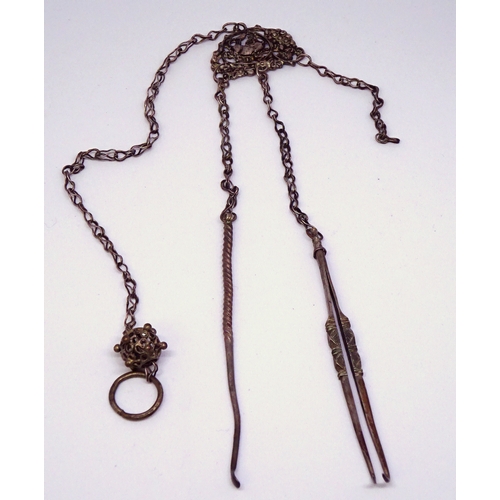 440 - A part set of Chinese opium tools on a chatelaine chain.