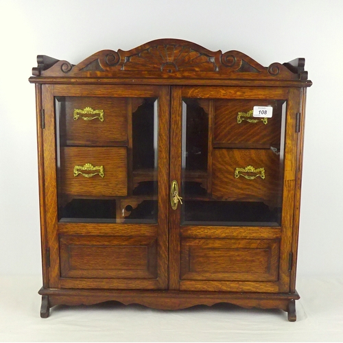 108 - An oak smokers cabinet