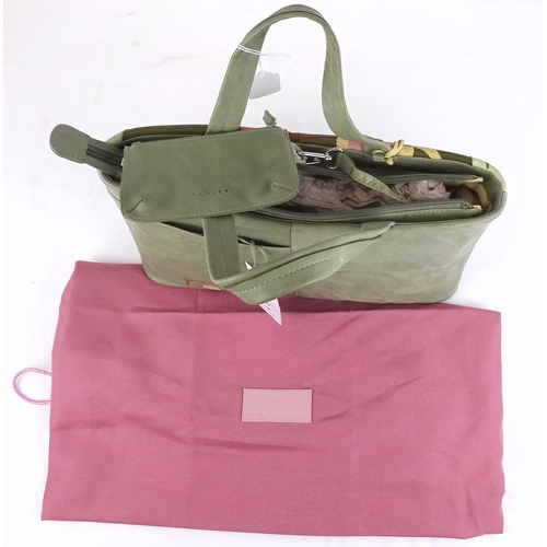 197 - A Radley handbag having fabric cover bag