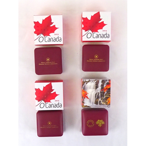 323 - Three O Canada 2013 10 Dollar collectors' coins: The Maple Leaf, Canadian Holiday Season, The Wolf, ... 