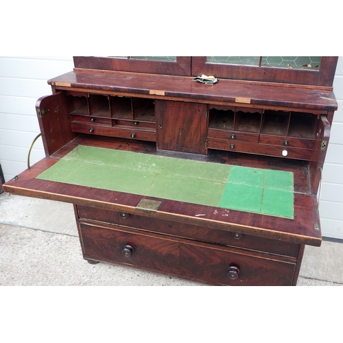 681 - A Victorian mahogany secretaire bookcase, a/f missing cornice, feet, some glass, 116cm wide