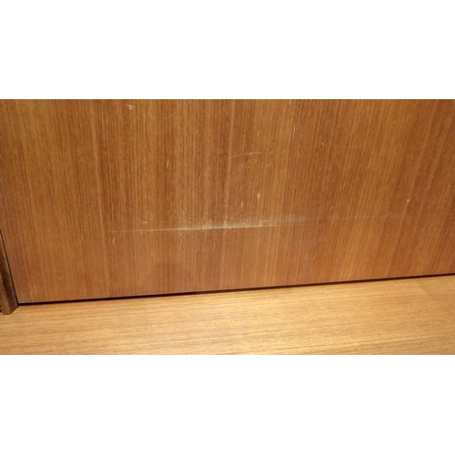 734 - A G.Plan teak three section side unit, some marks, 306cm wide