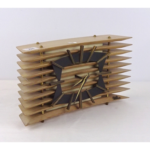 226 - A Kundo Electronic mantel clock in wooden 