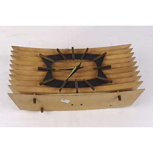 226 - A Kundo Electronic mantel clock in wooden 