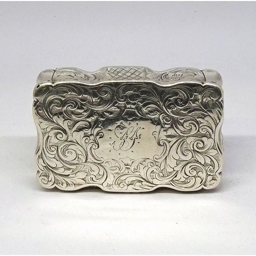 452 - A snuff box, silver having wavy edges and engraved foliate decoration incorporating a monogram SJ (?... 