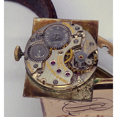 388 - A Rolex wristwatch having a Rolex Prima 15 jewel movement with a guilloche enamel dial in a 9ct gold... 