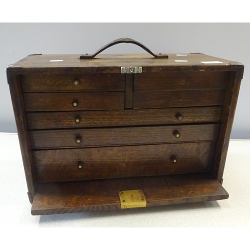 402 - An oak cased set of drawers.