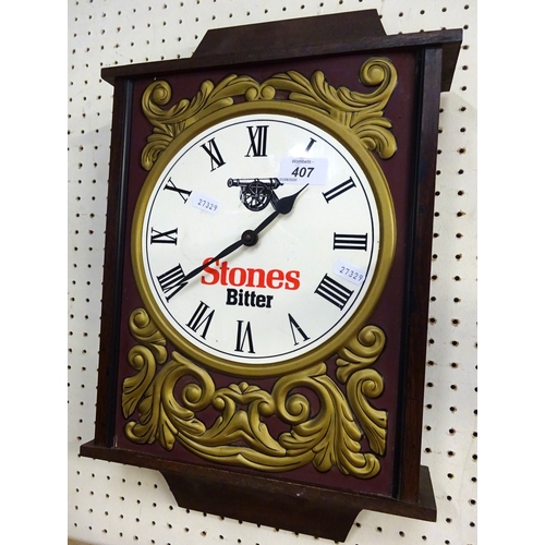407 - A Stones Bitter advertising clock.