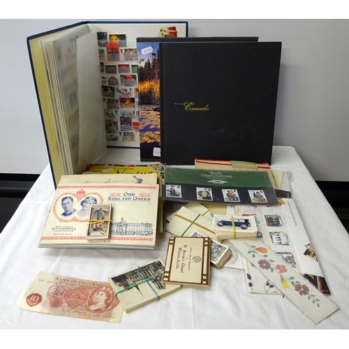 414 - A quantity of stamps, cigarette cards etc.