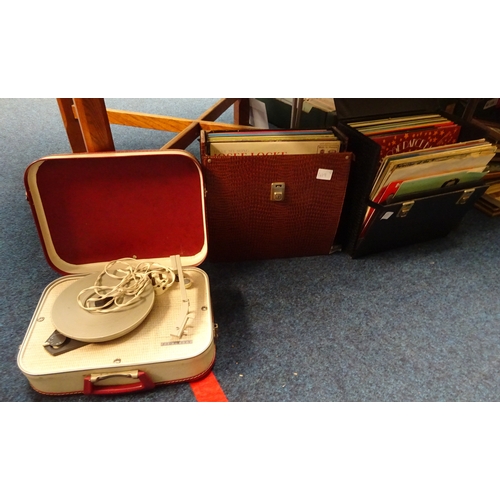 419 - A portable Fidelity record player together with two cases of lps.