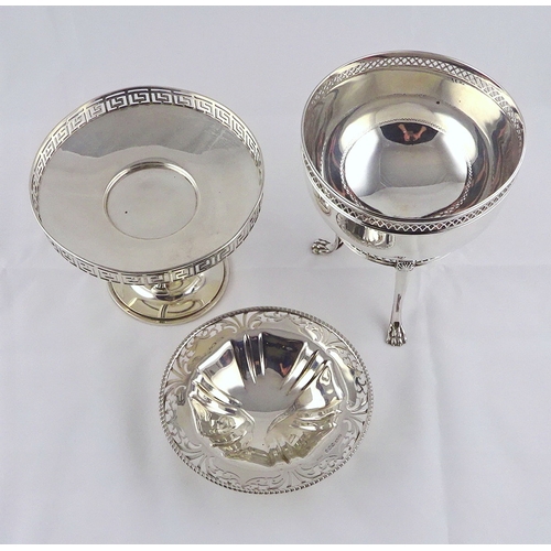 14 - A Georgian revival silver tripod dish having pierced rim, Sheffield 1909.  127mm diameter; a silver ... 