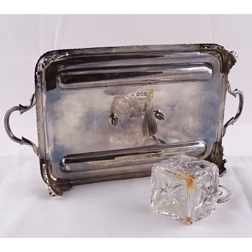24 - A silver desk stand, with central glass and silver inkwell, London 1901.  294mm handle to handle / s... 