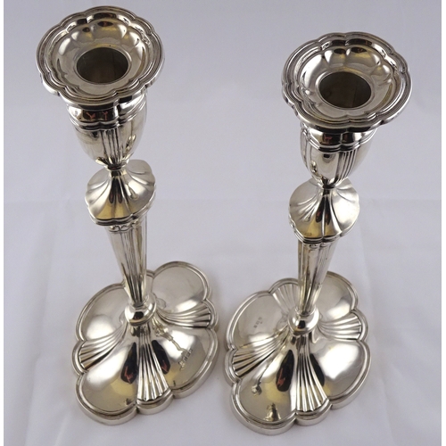 3 - A pair of George III style hollow silver candlesticks, Birmingham 1956.  700gr / 307mm (by instructi... 